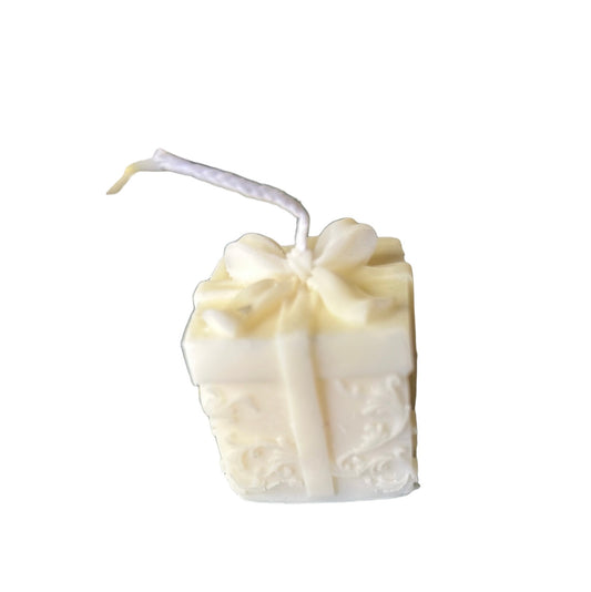 Small Christmas present candle
